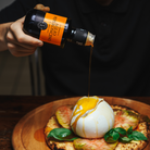 Toscano IGP Aglio e Peperoncino garlic and chilli olive oil — lifestyle image